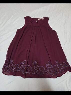Lavish Maroon Sleeveless Embroidered Hem Dress